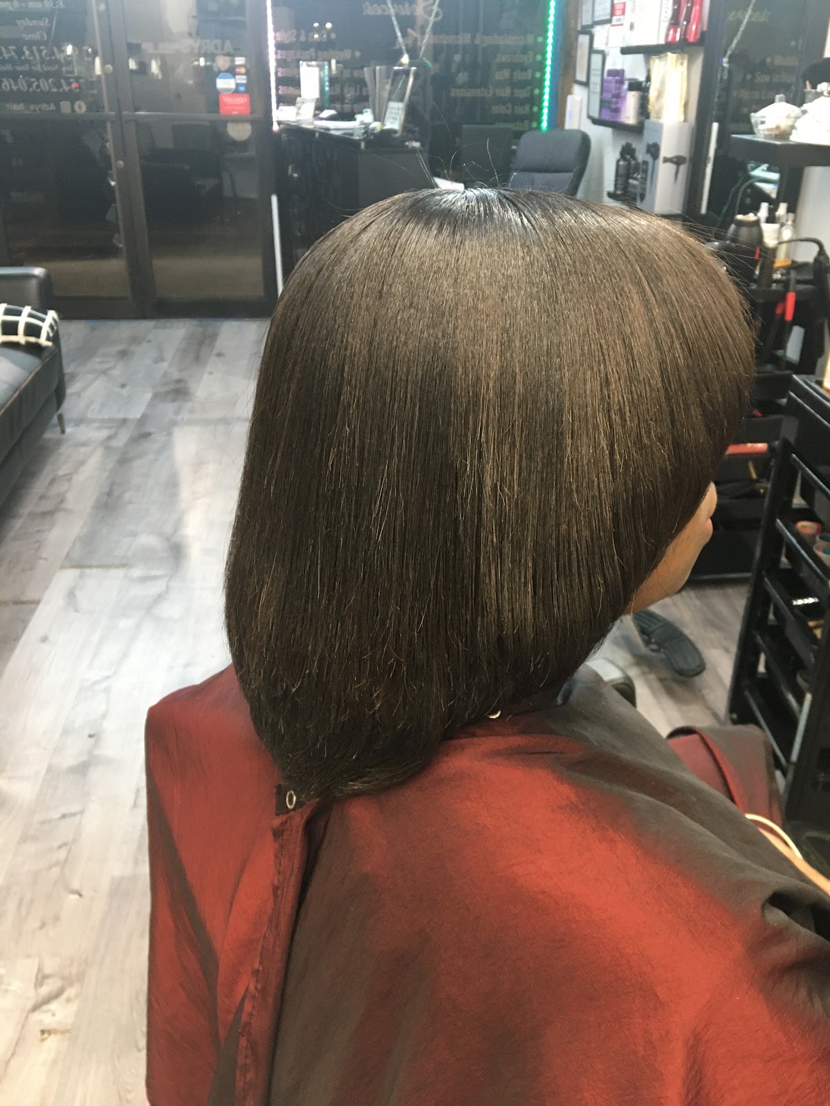 Sleek Dominican blowout at Adry's Salon & Spa styling station